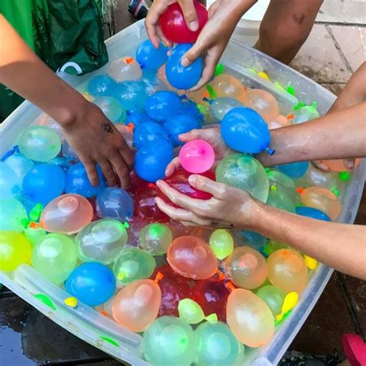 Family Fun! Kylie Jenner and Travis Scott Have a Water Balloon Fight With Daughter Stormi Webster